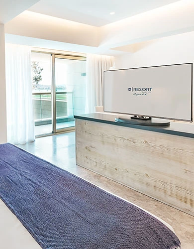D Resort Ayvalık Deluxe Oda konforlu yatak düzeni mobil galeri