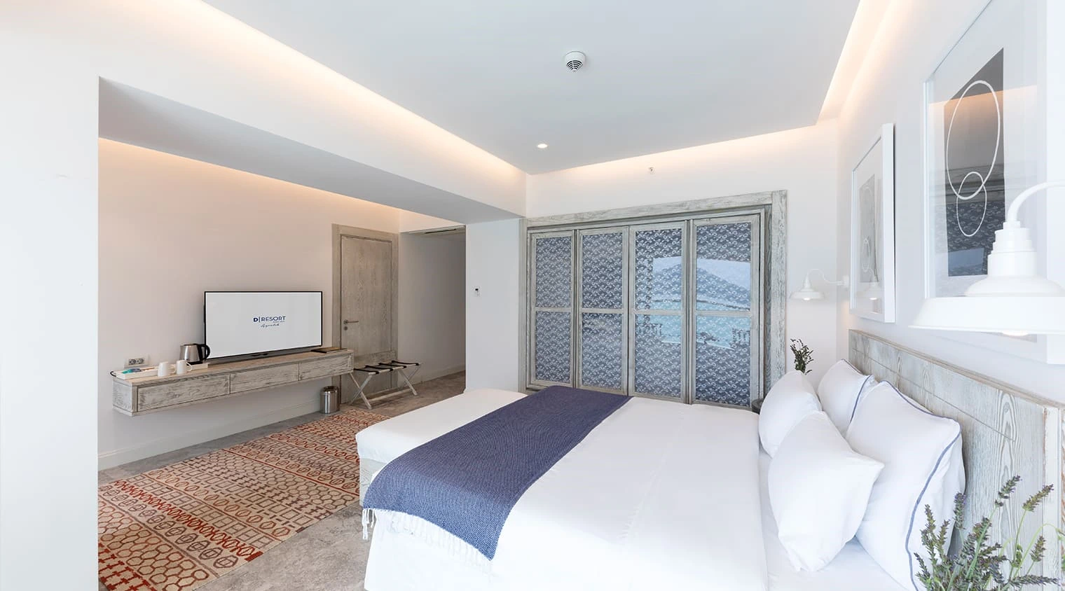D Resort Ayvalık Superior Deniz Manzaralı Oda yatak odası ve deniz manzarası